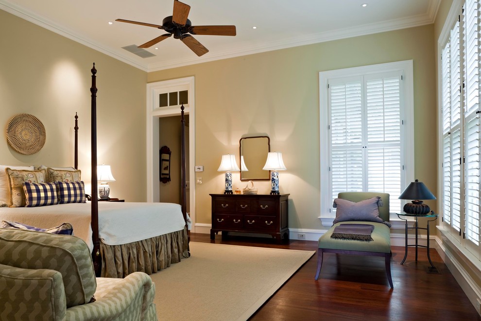 Design ideas for a medium sized classic master bedroom in New York with beige walls and dark hardwood flooring.
