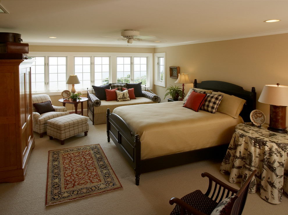 Design ideas for a large country master bedroom in Other with beige walls, carpet and beige floors.