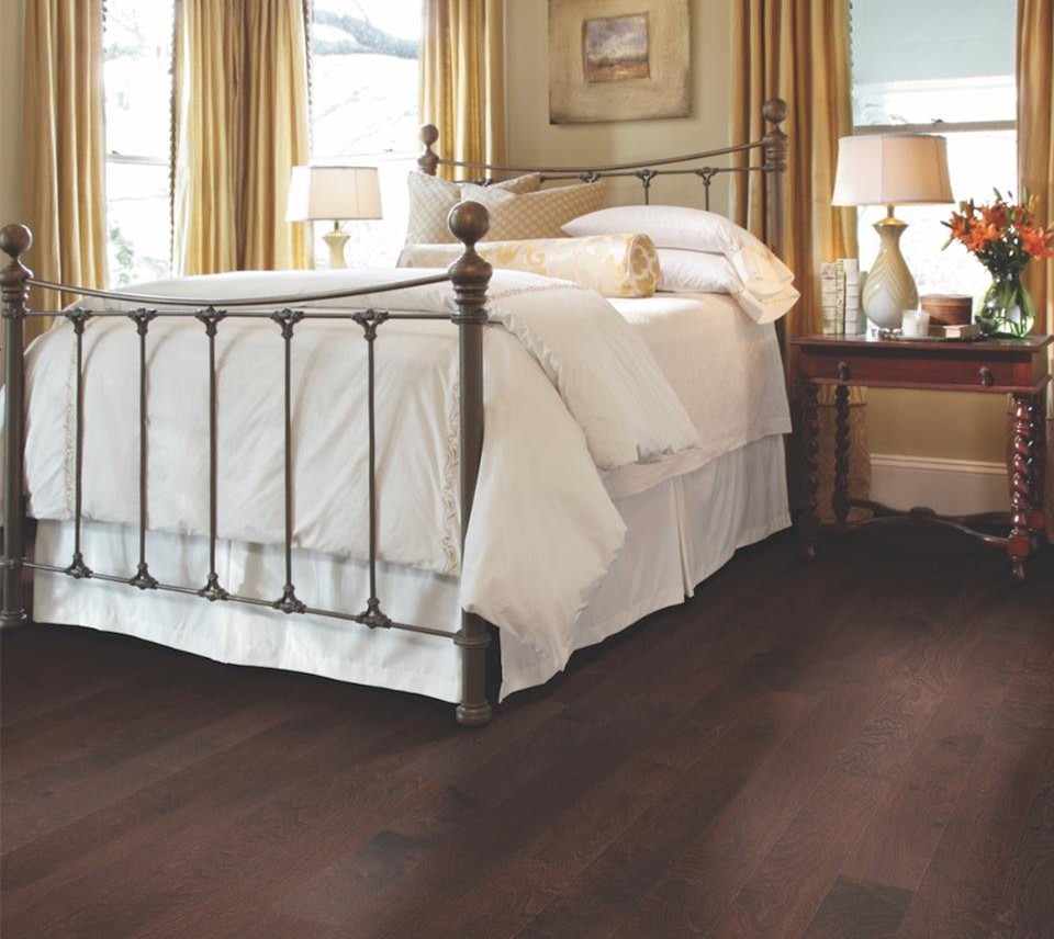 Inspiration for a large transitional master dark wood floor bedroom remodel in Boston with beige walls and no fireplace