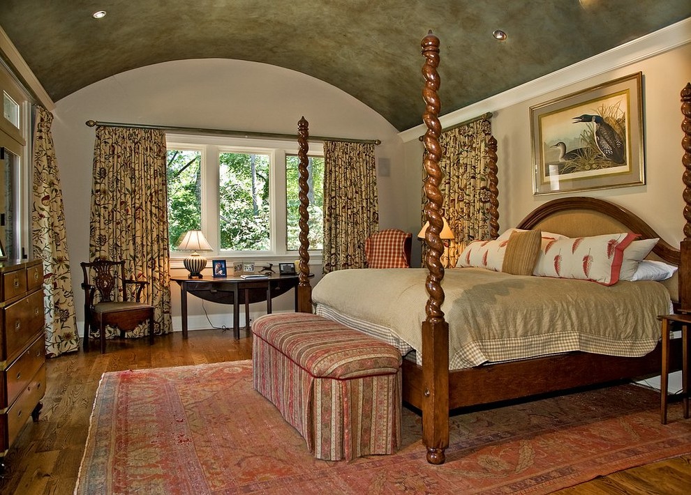 Photo of a traditional bedroom in Nashville with beige walls.