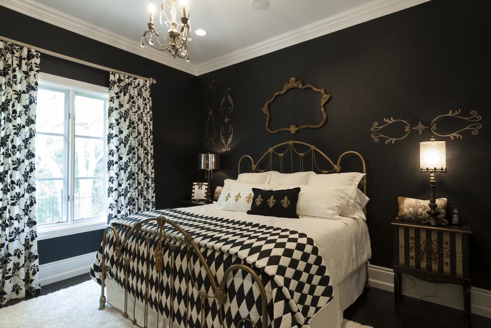 Photo of a victorian bedroom in Dallas with black walls.