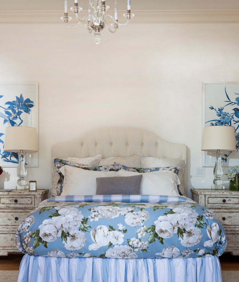 Design ideas for a traditional master bedroom in Los Angeles with white walls.
