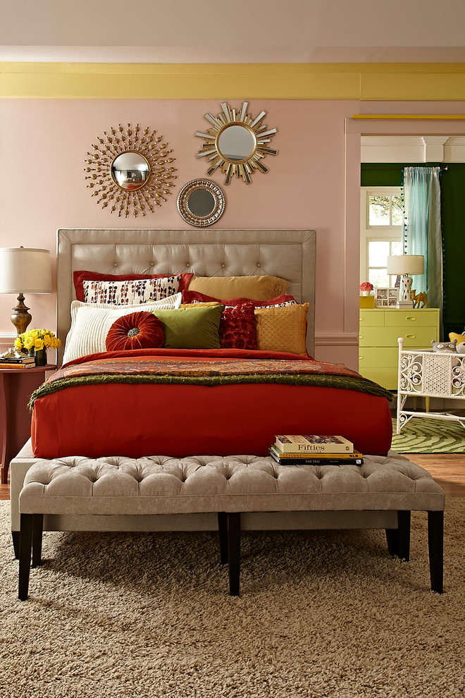 Inspiration for a medium sized modern master bedroom in Raleigh with pink walls and carpet.
