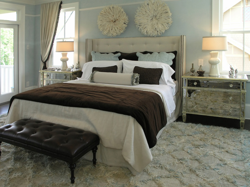 Inspiration for a large contemporary master bedroom in Richmond with blue walls and dark hardwood flooring.