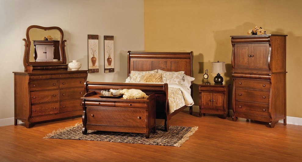 Design ideas for a large traditional master bedroom in Indianapolis with multi-coloured walls, medium hardwood flooring, no fireplace and brown floors.