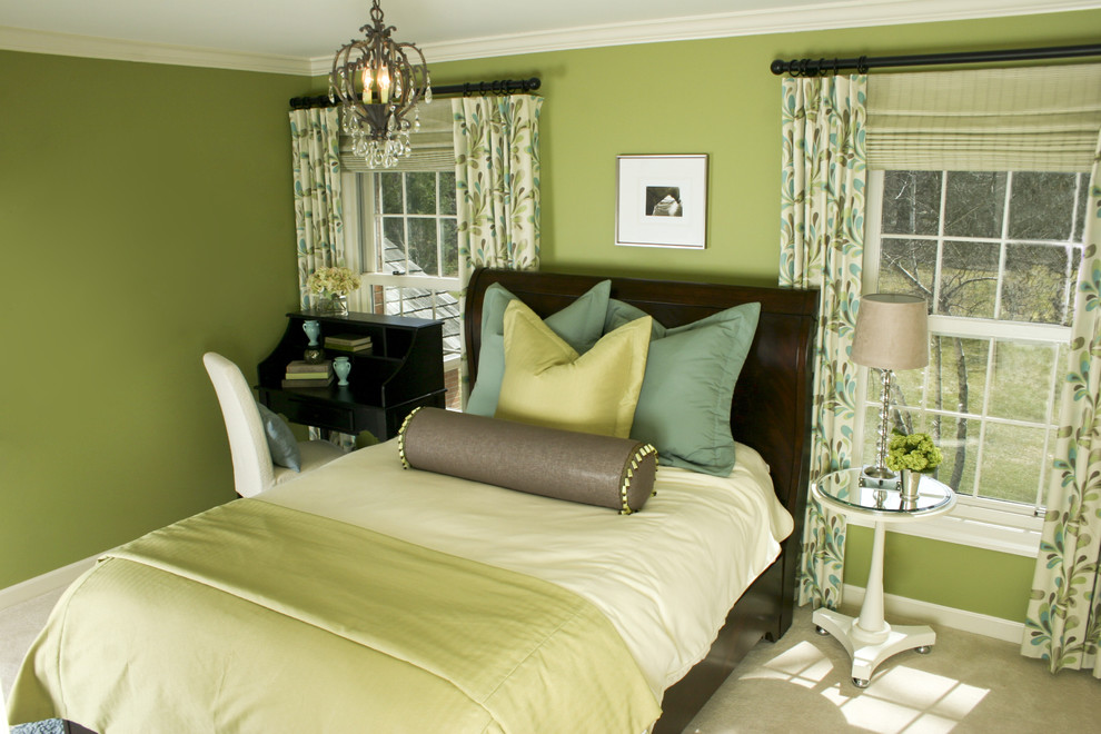 Immagine di una camera da letto minimal con pareti verdi