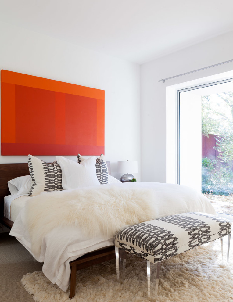 Inspiration for a contemporary carpeted bedroom remodel in Dallas with white walls and no fireplace