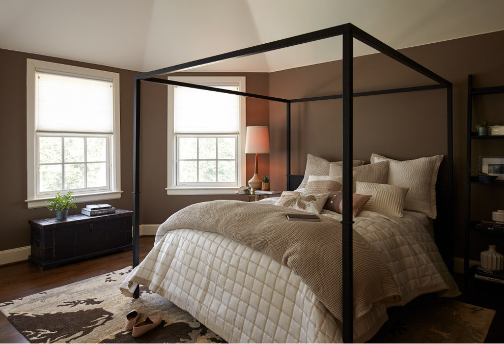 Example of a bedroom design in Orange County with brown walls