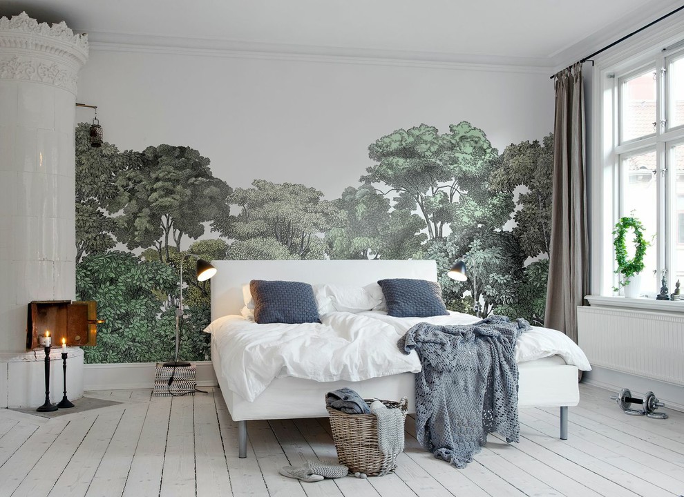 Photo of a large classic master bedroom in Gothenburg with multi-coloured walls, painted wood flooring, no fireplace, white floors and a feature wall.