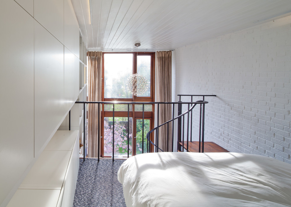 This is an example of a contemporary bedroom in London.