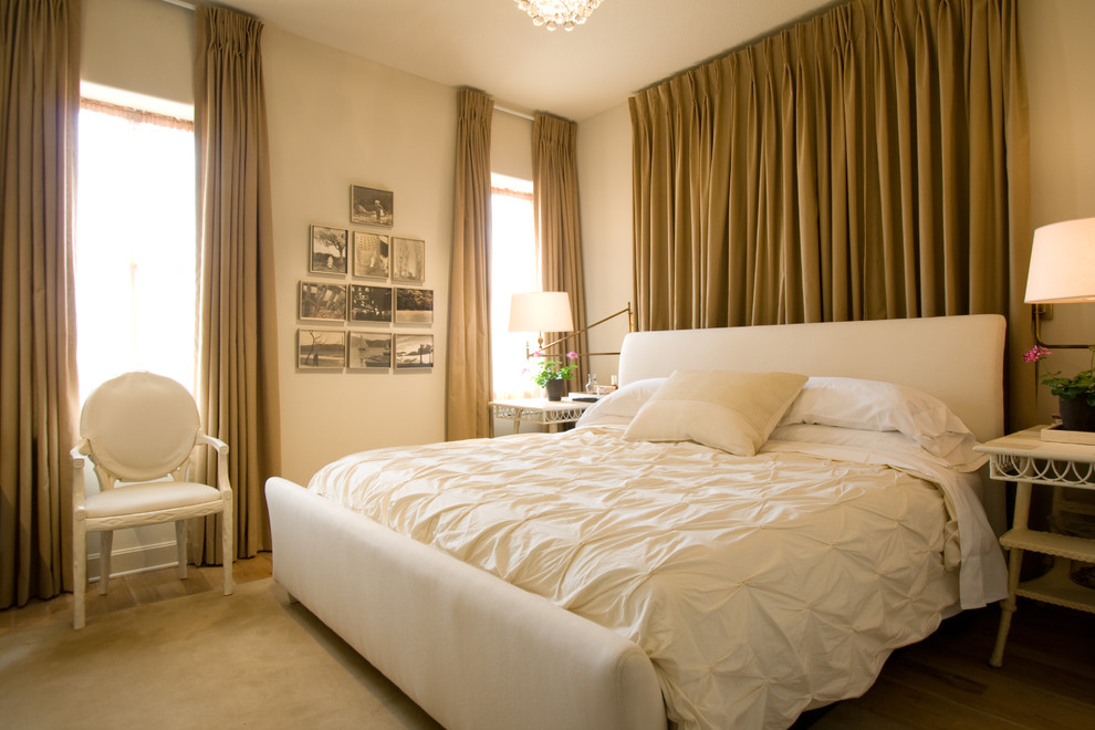 Example of a trendy bedroom design in Kansas City with beige walls