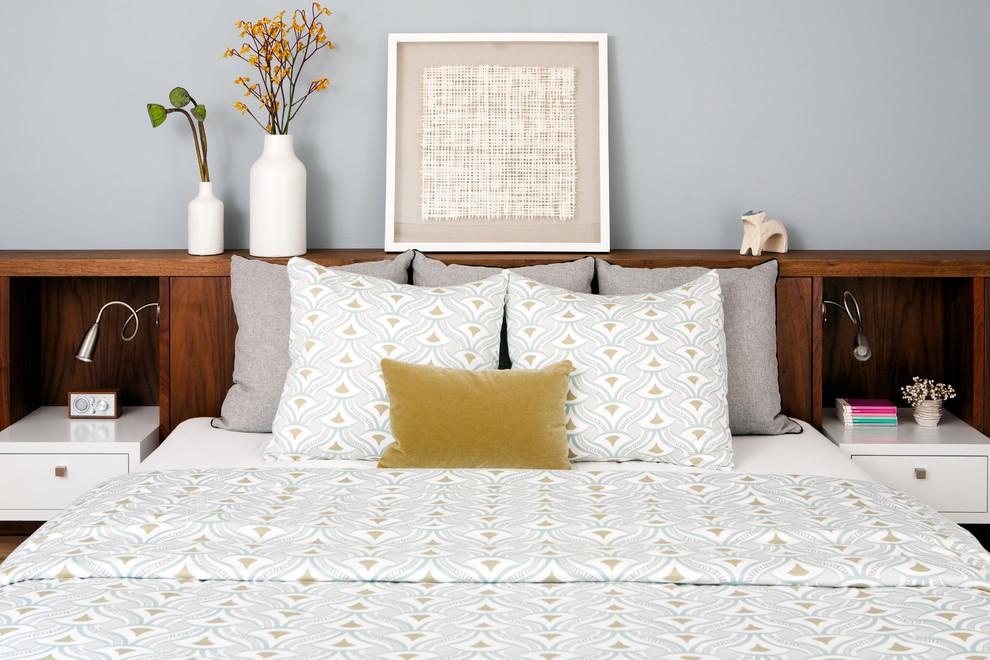 Design ideas for a midcentury grey and yellow bedroom in San Francisco.