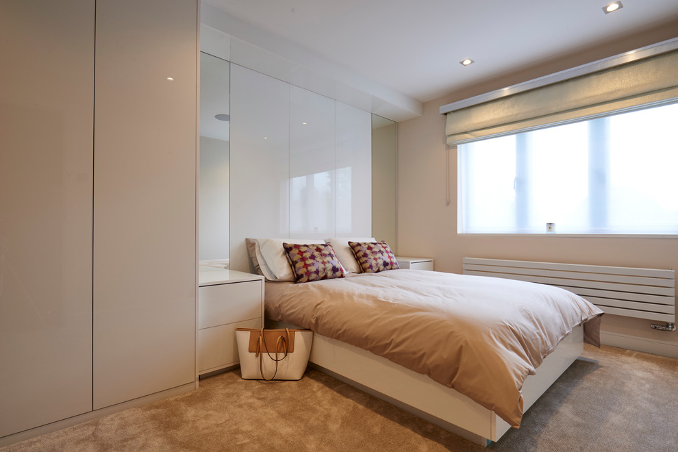 Photo of a contemporary master bedroom in Manchester.