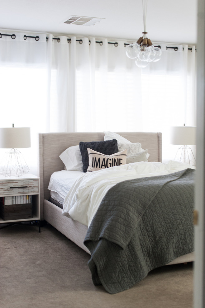 Large minimalist guest carpeted bedroom photo in Las Vegas with white walls