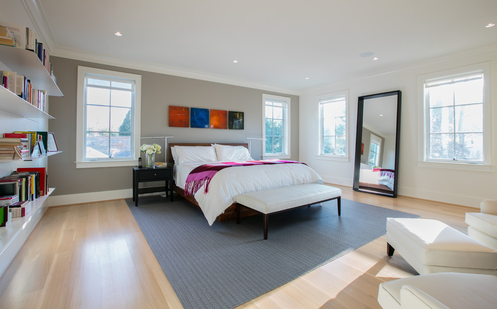 Inspiration for a large modern master light wood floor bedroom remodel in DC Metro with white walls