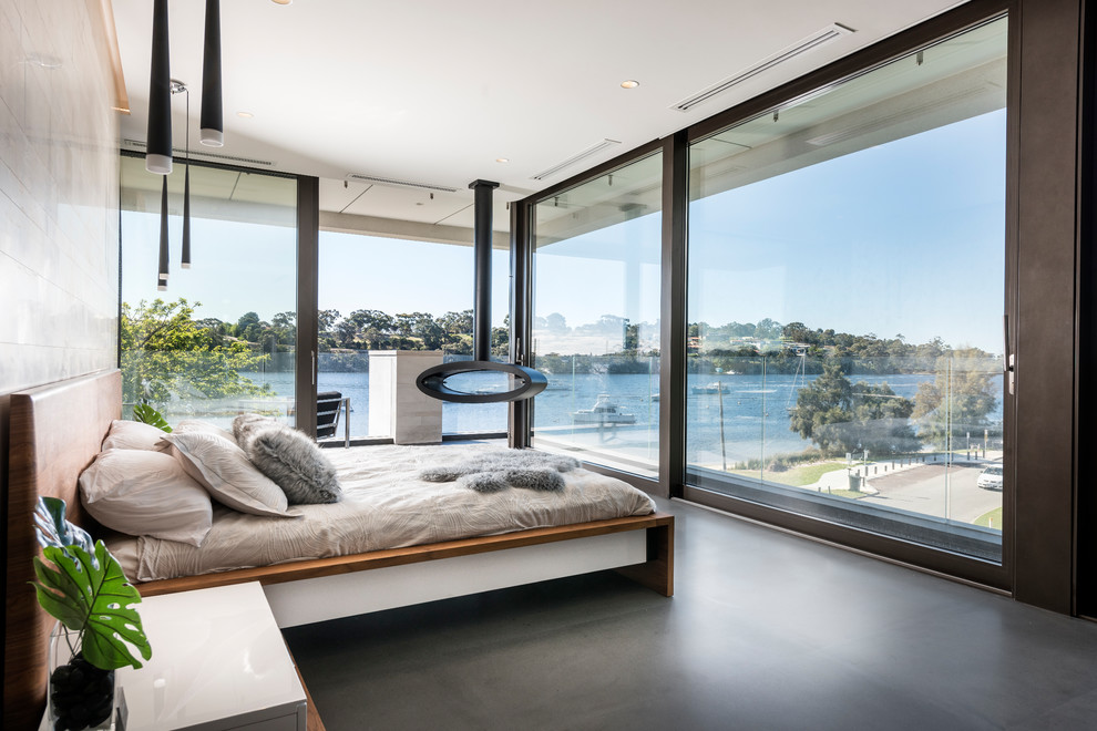 Bedroom - large contemporary black floor bedroom idea in Perth