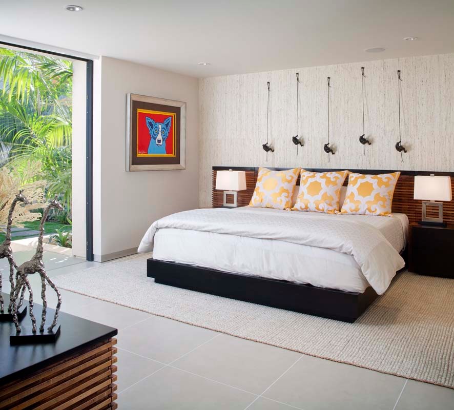 Design ideas for a large modern master bedroom in San Diego with white walls and ceramic flooring.