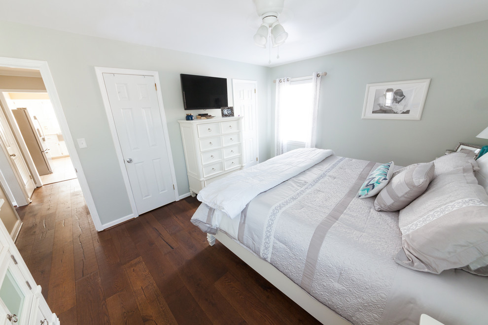 Example of a mid-sized mountain style master dark wood floor bedroom design in Birmingham with gray walls and no fireplace