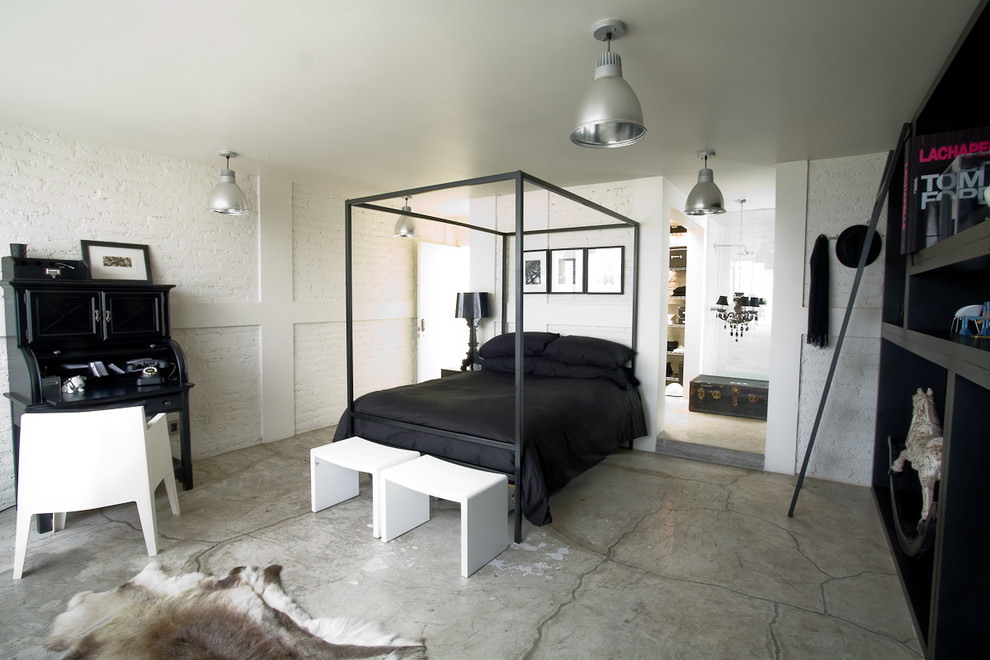 Design ideas for an industrial bedroom in Mexico City with concrete flooring and grey floors.