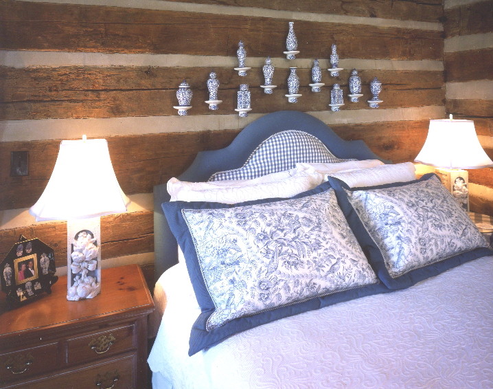 Medium sized traditional guest bedroom in Nashville with medium hardwood flooring.