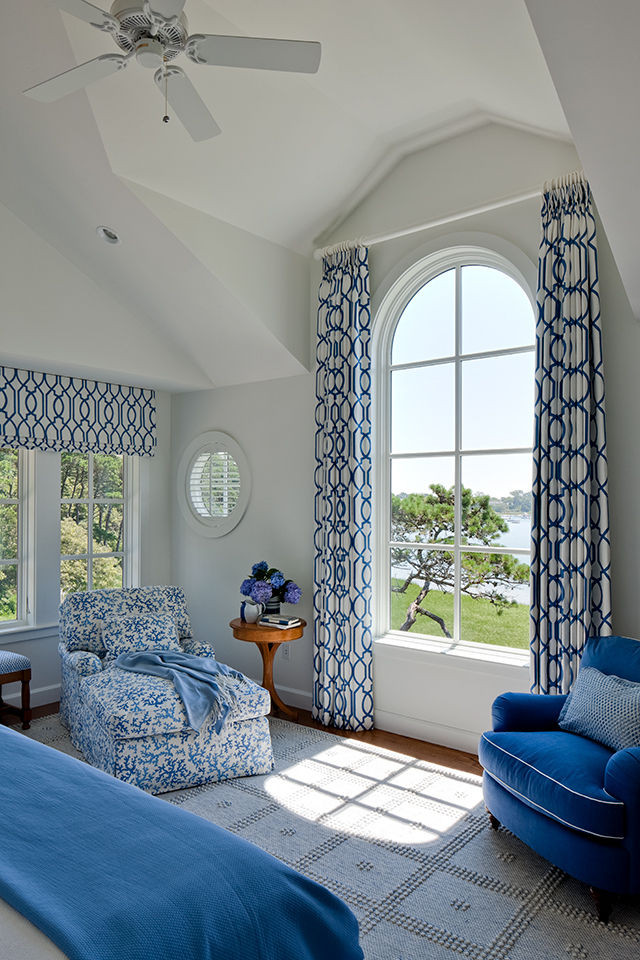 Blue & White Master Bedroom with Large Window Overlooking Harbor Salt