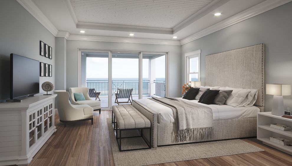 Example of a large classic master medium tone wood floor and beige floor bedroom design in Miami with gray walls and a metal fireplace