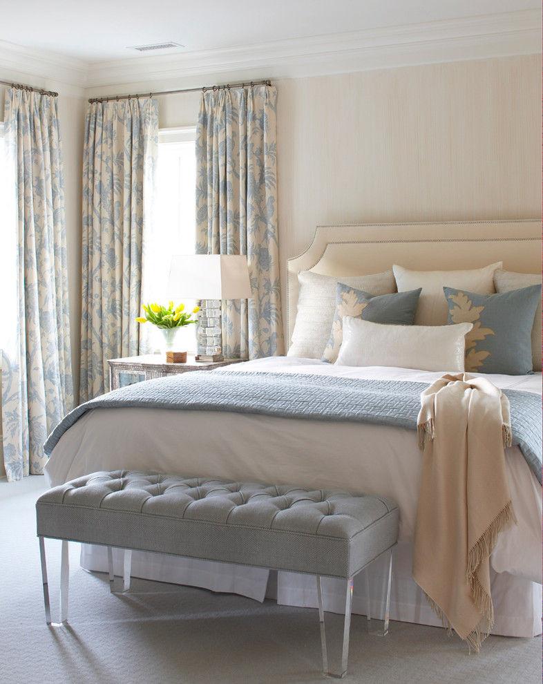 Beach style carpeted bedroom photo in New York with beige walls