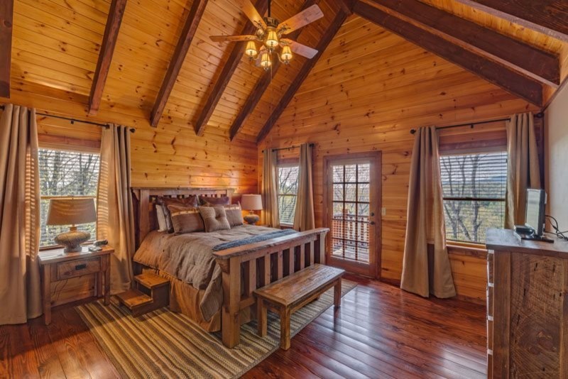 Photo of a rustic bedroom in Atlanta.