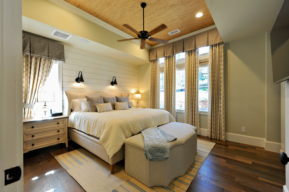 Design ideas for a large country master and grey and brown bedroom in Houston with grey walls, medium hardwood flooring, no fireplace, brown floors, a wallpapered ceiling and tongue and groove walls.