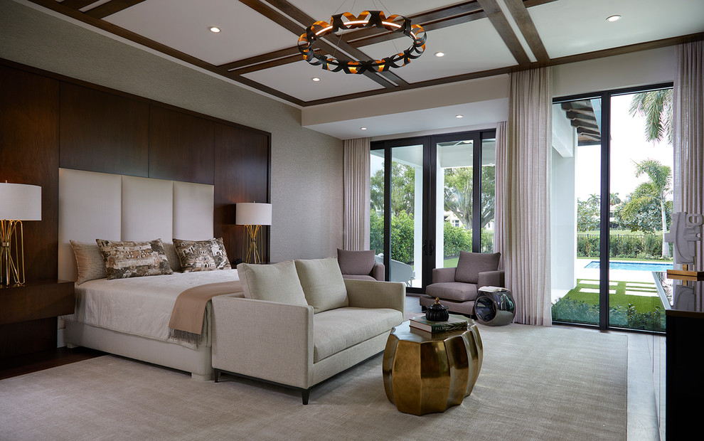 Inspiration for a large contemporary bedroom in Miami with carpet and grey walls.