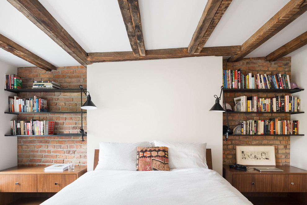 Inspiration for a classic bedroom in New York with white walls.