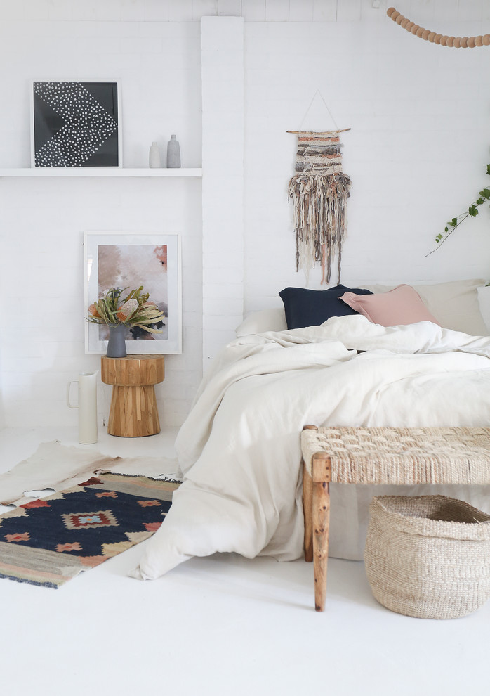 Inspiration for a shabby-chic style bedroom in Las Vegas with white walls.