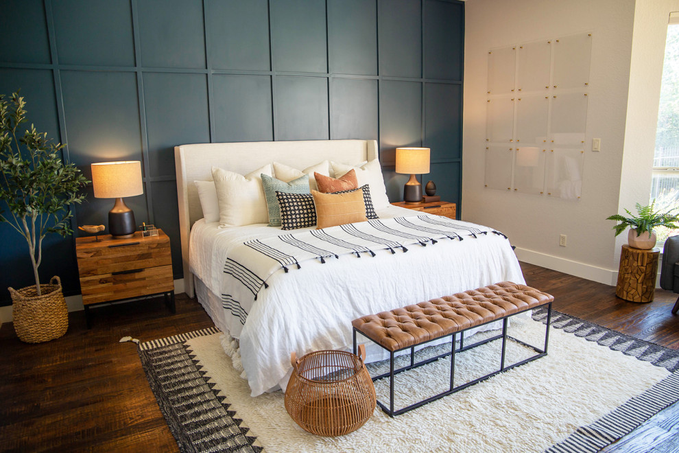 This is an example of a medium sized classic master bedroom in Dallas with medium hardwood flooring, white walls, no fireplace and brown floors.