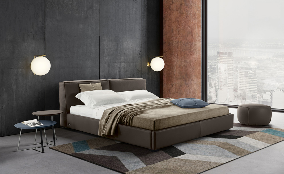 Idéer för ett stort modernt sovloft, med grå väggar, betonggolv och grått golv