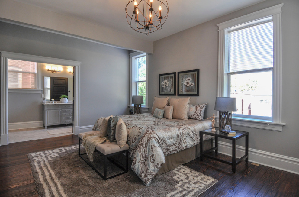 Inspiration for a medium sized classic master bedroom in St Louis with grey walls and medium hardwood flooring.