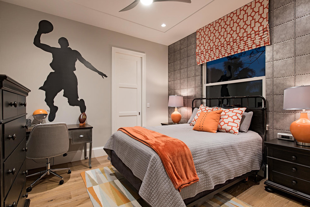 Immagine di una camera degli ospiti minimal con pareti grigie e parquet chiaro