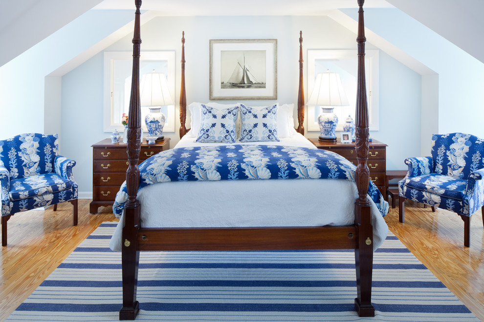 Inspiration for a timeless medium tone wood floor bedroom remodel in Baltimore with blue walls