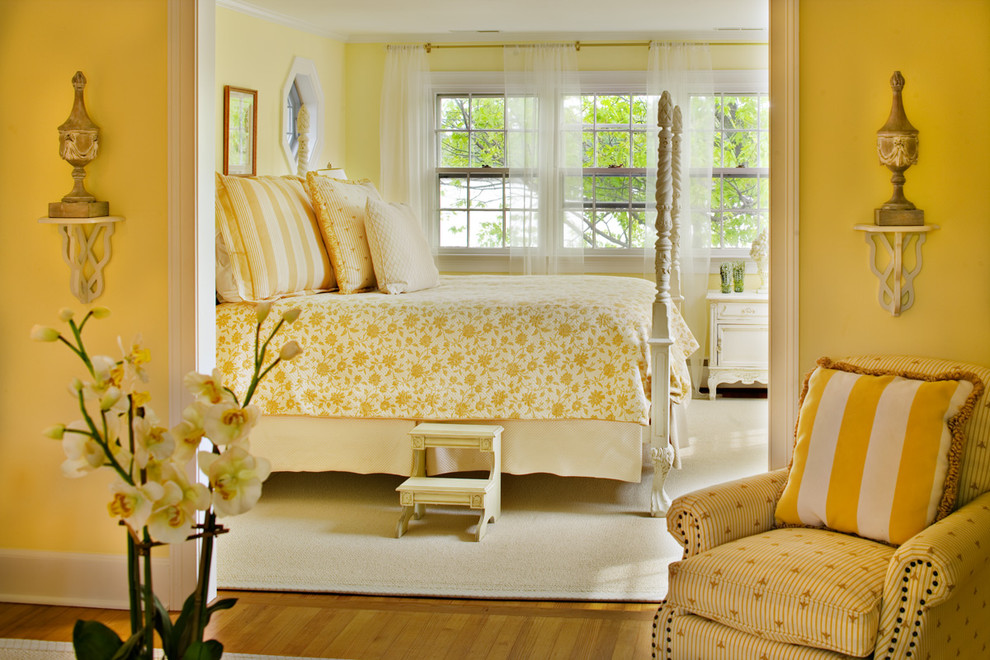 Example of a classic bedroom design in Baltimore with yellow walls