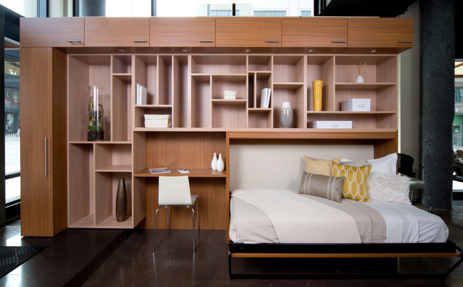 Стильный дизайн: маленькая гостевая спальня (комната для гостей) в стиле модернизм с бетонным полом и коричневым полом без камина для на участке и в саду - последний тренд