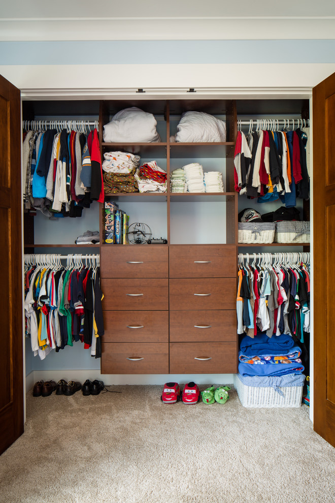 Example of a mid-sized arts and crafts carpeted closet design in San Francisco
