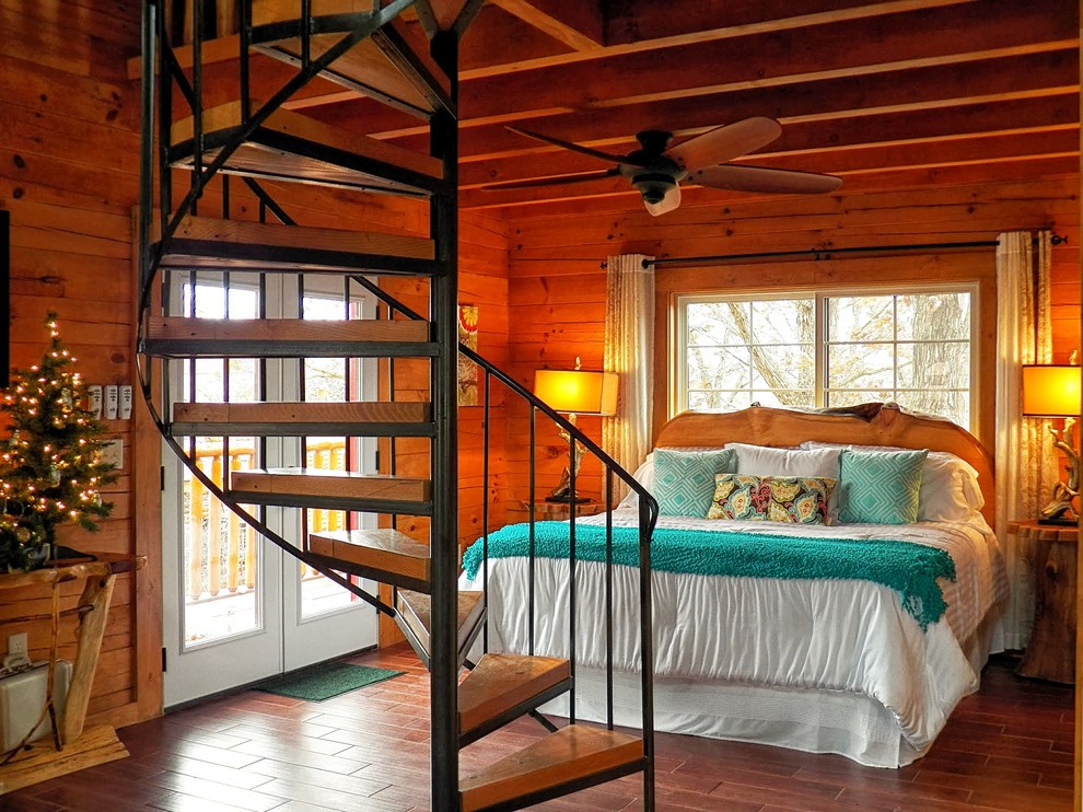 Inspiration for a rustic master bedroom in Grand Rapids.