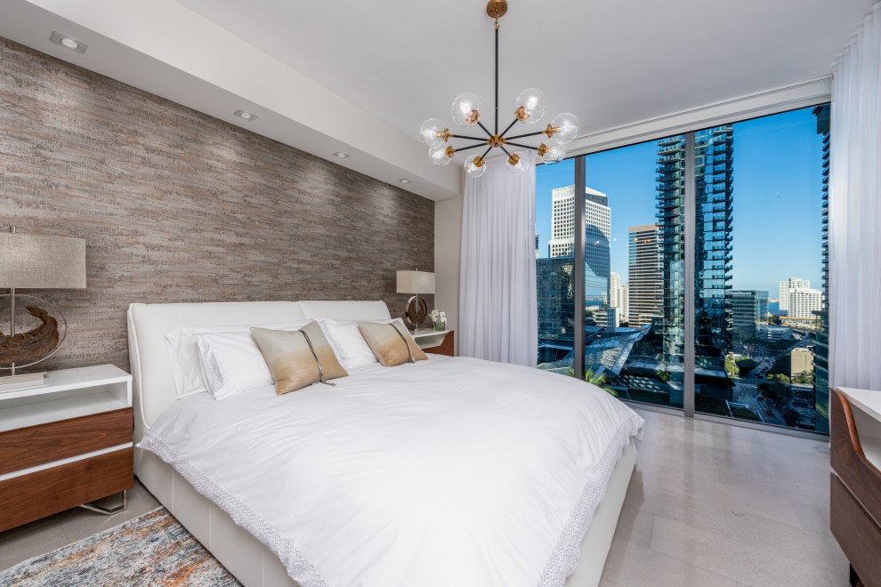 Design ideas for a medium sized modern master bedroom in Miami with porcelain flooring and grey floors.