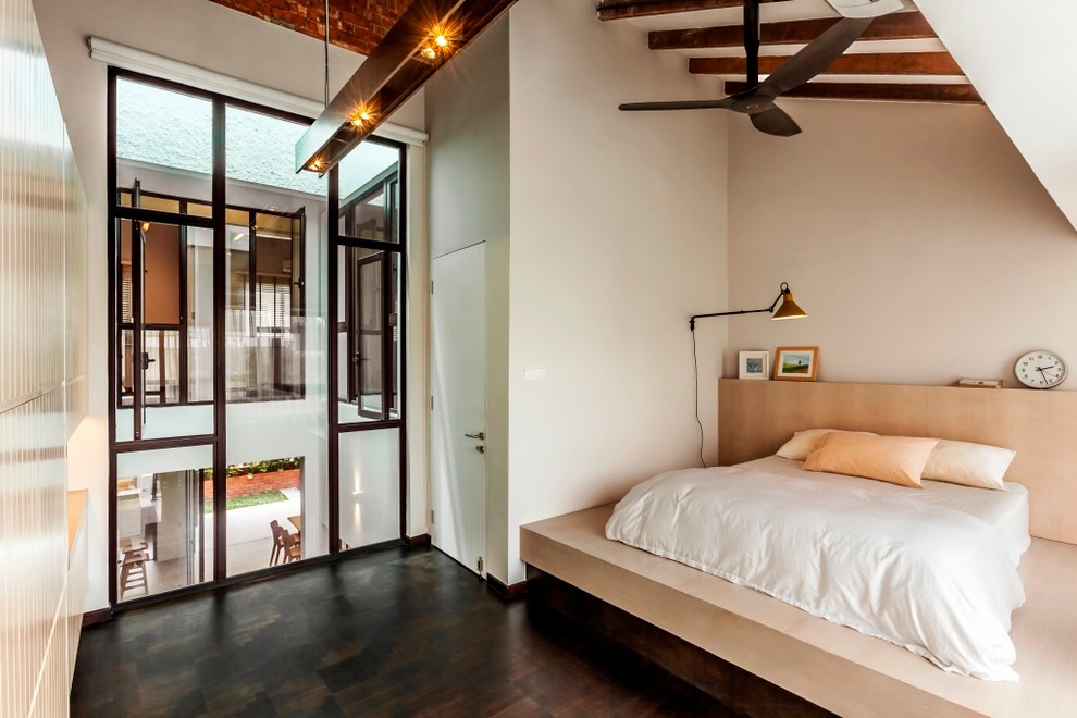 Inspiration for a rustic bedroom remodel in Singapore