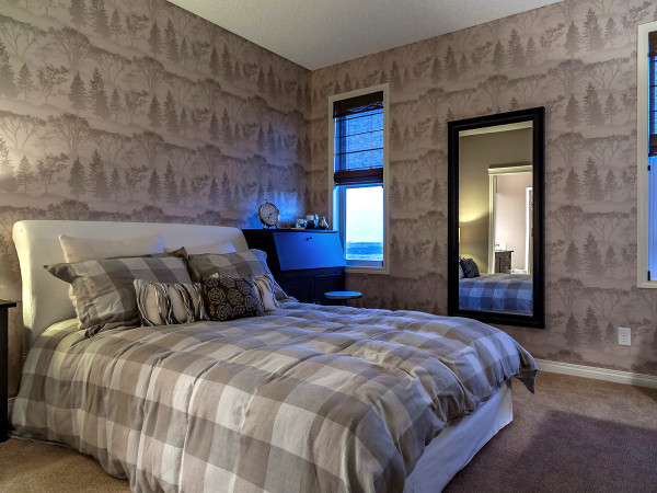 This is an example of a contemporary bedroom in Calgary.