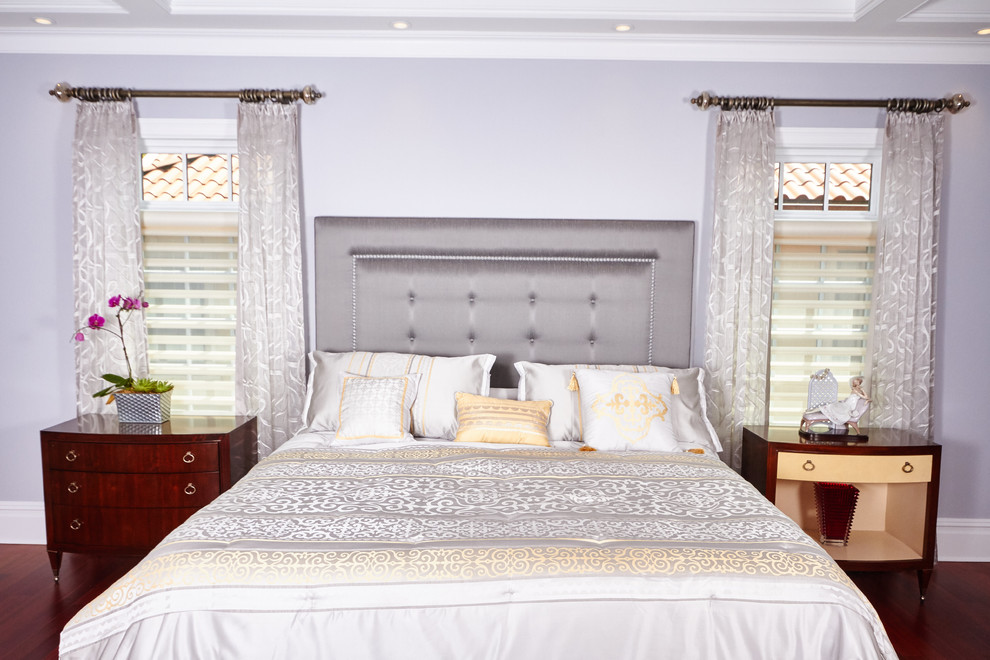 Example of a transitional master bedroom design in New York