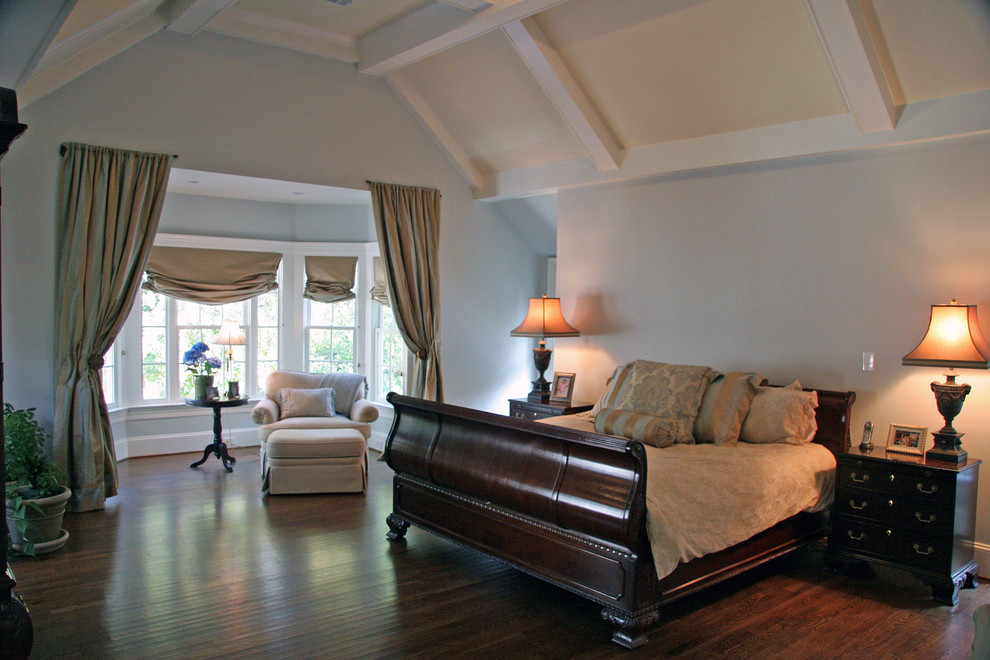 Bedroom - mid-sized traditional master dark wood floor and brown floor bedroom idea in Atlanta with blue walls