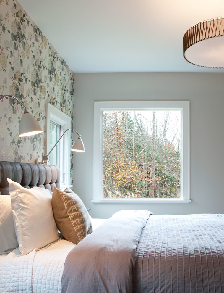 Country master bedroom photo in New York with gray walls