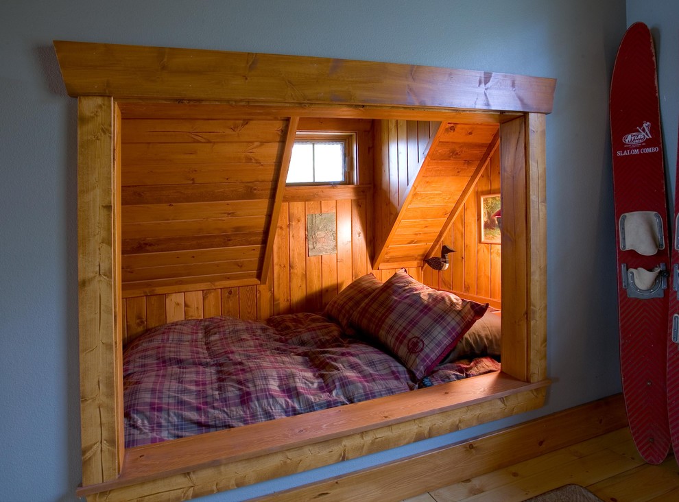 Inspiration för ett rustikt sovrum
