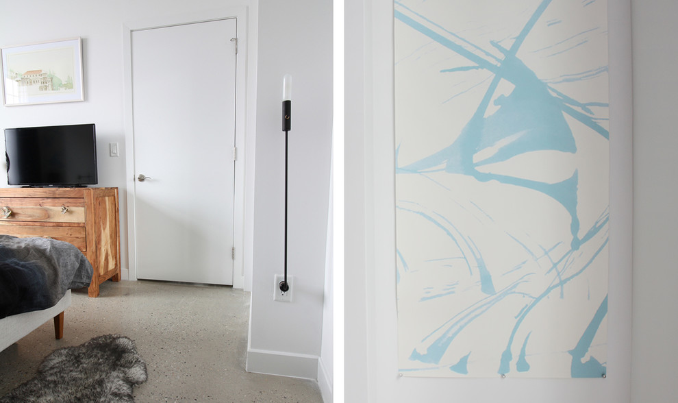 ニューヨークにある中くらいなエクレクティックスタイルのおしゃれな主寝室 (白い壁、コンクリートの床、暖炉なし)