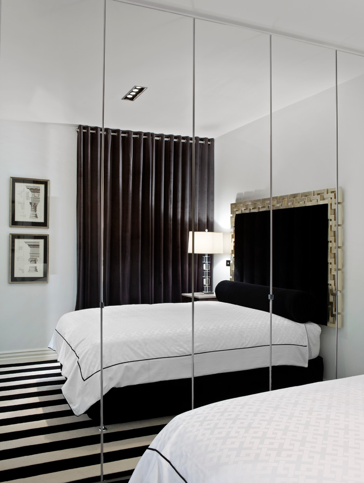 Contemporary bedroom in Melbourne with feature lighting.
